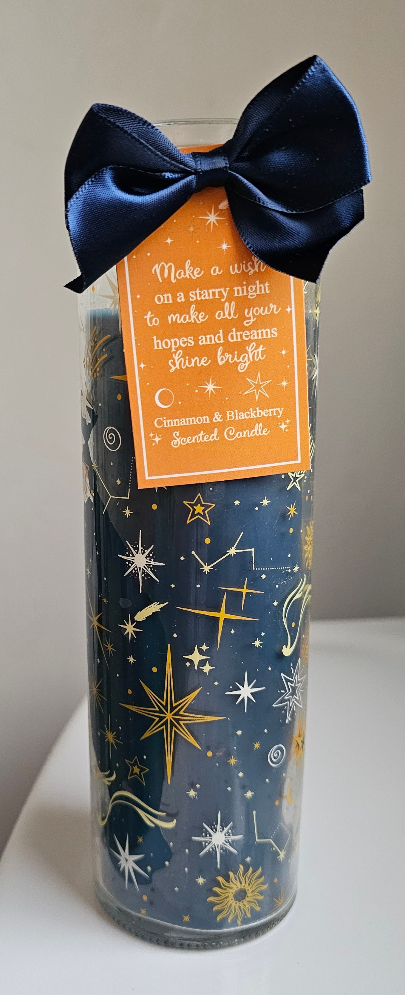 Celestial fruity blackberry scented glass tube candle with a 60 hour burn time 