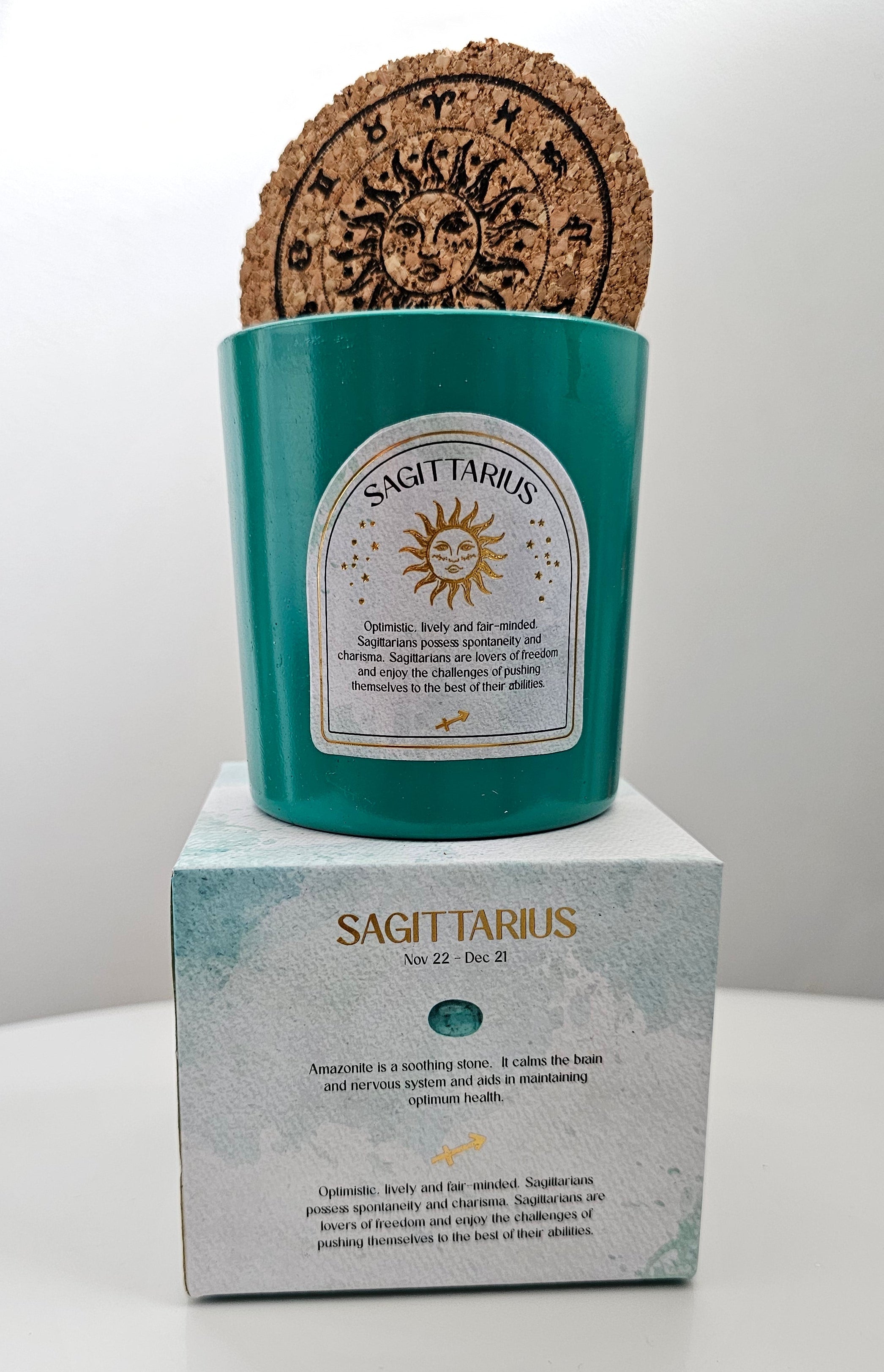 Sagittarius teal zodiac candle with crystals 
